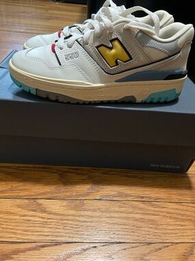 New Balance Kids White Sneakers with Yellow Logo and Teal Accents